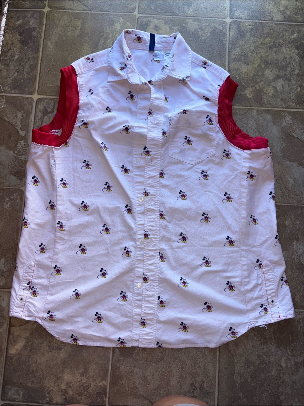 H&M White Sleeveless Button-Up Top with Red Trim and Character Print